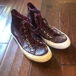 One of a king burgundy/purple leather converse